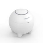Angled perspective view of the compact white spherical UV ultrasonic cleaner with lid closed on four support legs.